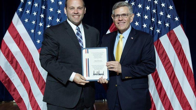Dr. Daniel Garmann (left) received the Presidential Early Career Award for Scientists and Engineers from Kelvin Droegemeier, director of the Office of Science and Technology Policy, at a July 25 ceremony in Washington, D.C. (U.S. Department of Energy photo/Donica Payne)
