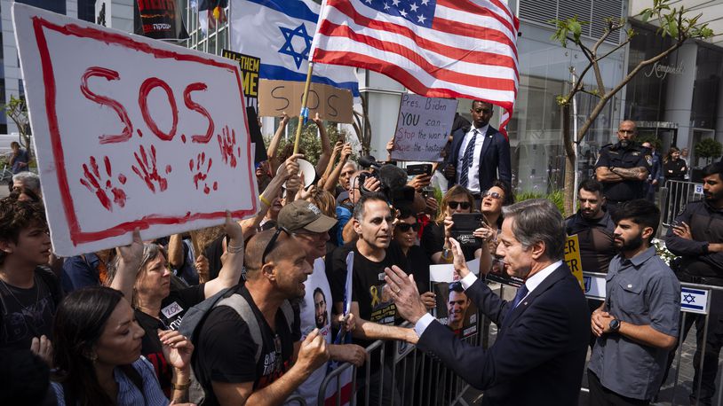 U.S. Secretary of State Antony Blinken speaks to families and supporters of Israeli hostages held by Hamas in Gaza during a protest calling for their return, after meeting families of hostages in Tel Aviv, Israel, Wednesday, May 1, 2024. (AP Photo/Oded Balilty)