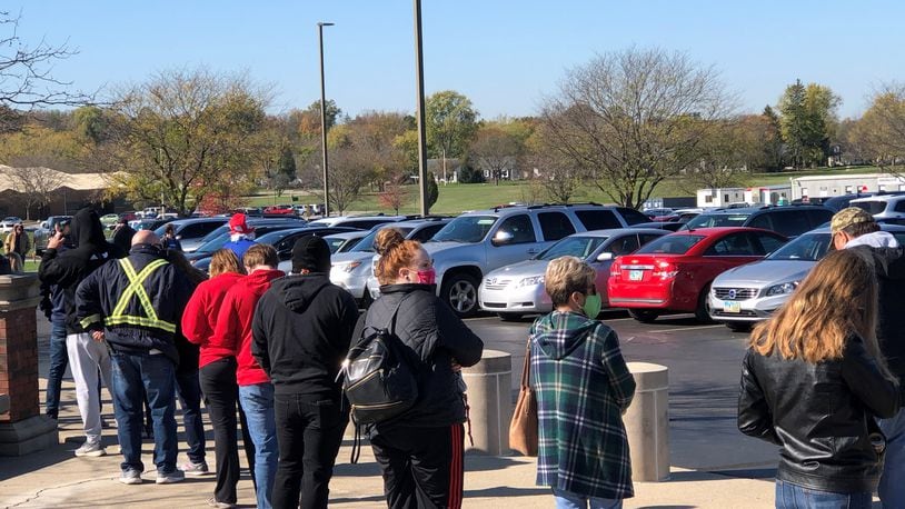 More than 50 people were in a line Monday morning for early voting at the Warren County Board of Elections office. The line stretched along front of common pleas court and parking lot. Ohio’s early voting ends at 2 p.m. Monday, Nov. 2, 2020. LAWRENCE BUDD/STAFF