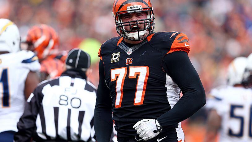 CINCINNATI, OH - JANUARY 05: Tackle Andrew Whitworth #77 of the Cincinnati Bengals reacts against the San Diego Chargers during a Wild Card Playoff game at Paul Brown Stadium on January 5, 2014 in Cincinnati, Ohio. (Photo by Andy Lyons/Getty Images)