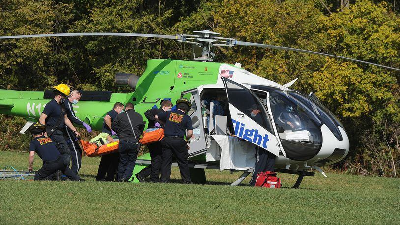 The Kettering Health Network’s Surgical Emergency Response Team (SERT) held an exercise Friday, Oct. 9, 2020, at Tom’s Mulch & Landscaping alongside the Sugarcreek Twp. Fire Department, Kettering Mobile Care and MedFlight. STAFF PHOTO / MARSHALL GORBY
