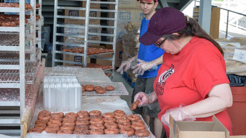 The return of the Troy Strawberry Festival for the first time since 2020 is expected to draw visitors as are several other activities old and new, such as the Great Ohio Bicycle Adventure’s return in June and the Tour de Donut in August, Stewart said. TOM GILLIAM / CONTRIBUTING PHOTOGRAPHER