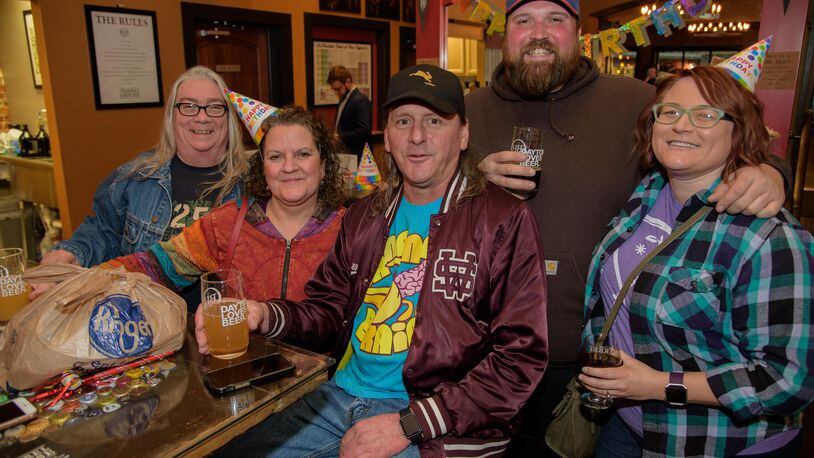The Barrel House celebrated Dayton's 222 birthday by tapping beer from local breweries, serving food from Underdogs Mobile and featuring entertainment by Dayton musicians on Saturday, March 31. PHOTO / TOM GILLIAM PHOTOGRAPHY