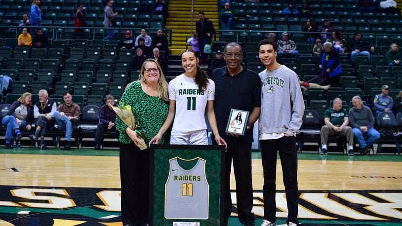 At Wright State’s Senior Day last month at the Nutter Center, Rachel Loobie is flanked by her mom, Susan; dad Patrick; and brother Caleb. Loobie leads the Raiders in rebounds, blocked shots and field goal percentage. Wright State Athletics photo