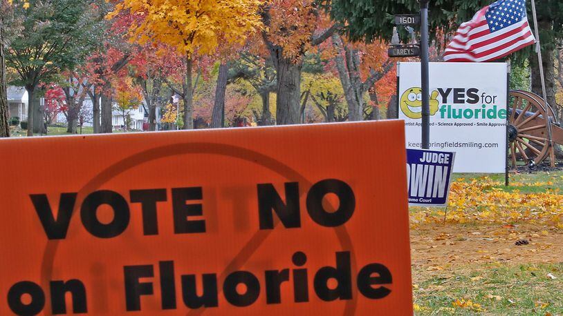 Signs along North Fountain Avenue for and against flouride in the water in Springfield. BILL LACKEY/STAFF