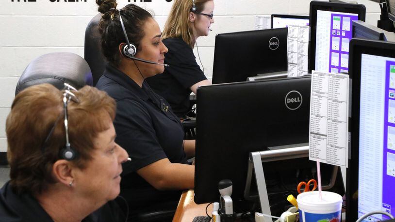Dispatchers in the Clark County Dispatch Center. Bill Lackey/Staff