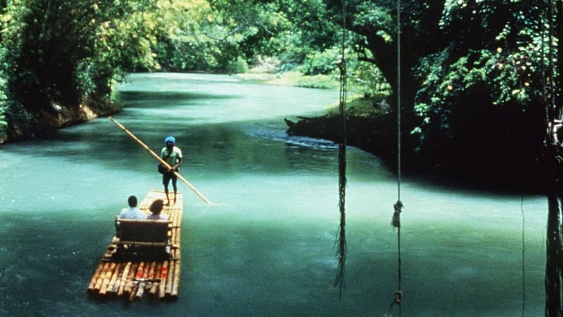Could an increase in international visitors to Cuba also boost interest in travel to Jamaica? Tourists are shown rafting on Jamaica’s Martha Brae. (Courtesy of the Jamaica Tourism Board/TNS)