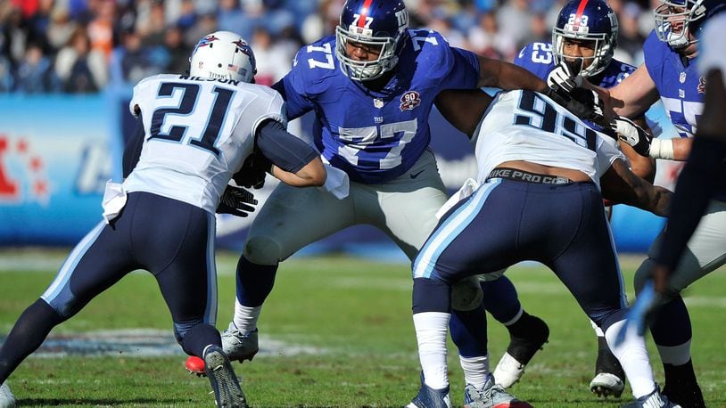 NASHVILLE, TN - DECEMBER 07: John Jerry #77 of the New York Giants plays against the Tennessee Titans at LP Field on December 7, 2014 in Nashville, Tennessee. (Photo by Frederick Breedon/Getty Images)