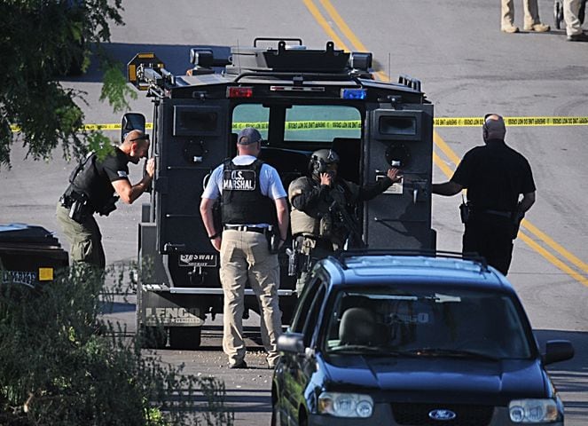 SWAT on scene of standoff involving barricaded person in Harrison Twp.