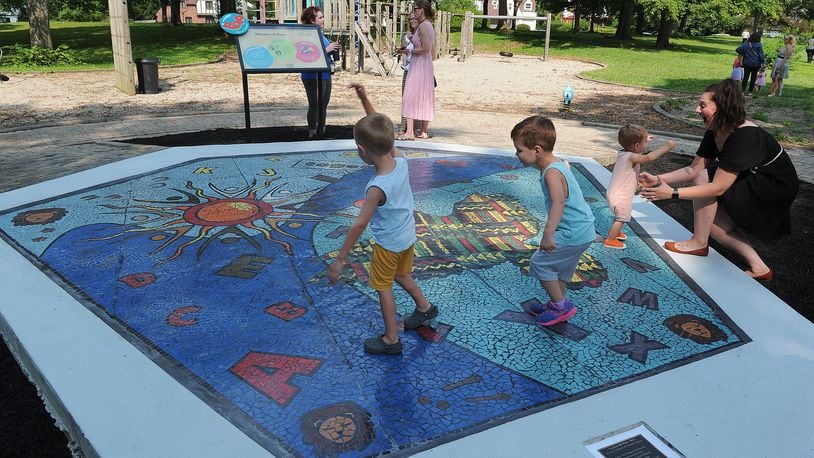 Children play at the Hope Center for Families in Dayton, July, 2021. A new assessment of the region looks at how health is affected by not just clinical care, but also neighborhood environment, preschool access, income inequality and more.  MARSHALL GORBY\STAFF