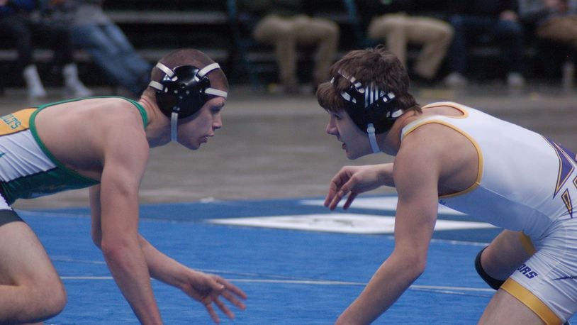 Butler’s Ronnie Pietro (right) and Northmont’s Chad Craft square off in the finals at 120 pounds Wednesday at the GMVWA Holiday Tournament. Pietro claimed the title with a 4-0 win. John Cummings/Contributed photo