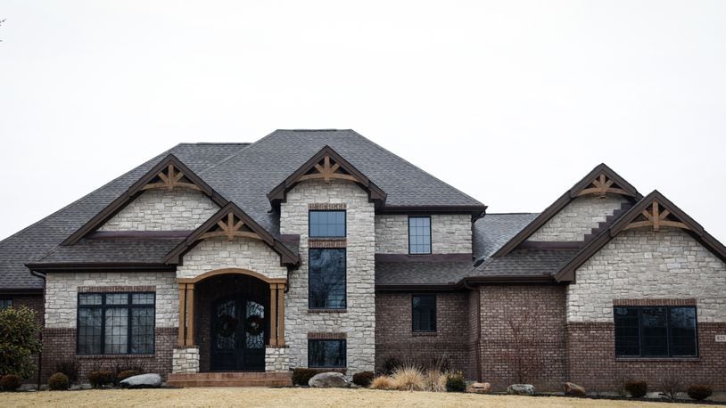 This 4-bedroom, 4-bathroom, 5,121-square-foot home in the 8200 block of Turning Leaf Crossing in Clearcreek Twp. sold for full price at $975,000 in just five days last year. The luxury home market in the Dayton area continues to soar and shows no sign of coming down. JIM NOELKER/STAFF