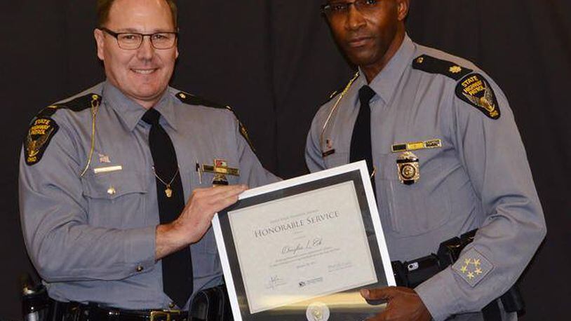 Former Lt. Doug Eck retires from the Ohio State Highway Patrol after serving 25 years.