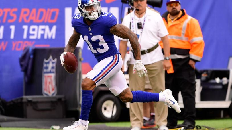 EAST RUTHERFORD, NJ - OCTOBER 08: Odell Beckham #13 of the New York Giants scores on a fourth quarter touchdown reception against the Los Angeles Chargers during an NFL game at MetLife Stadium on October 8, 2017 in East Rutherford, New Jersey. The Los Angeles Chargers defeated the New York Giants 27-22. (Photo by Steven Ryan/Getty Images)