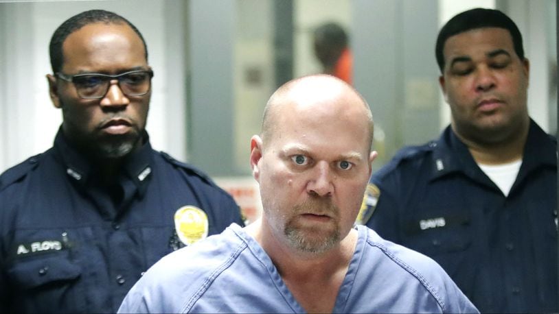 Gregory Alan Bush Sr. is arraigned on two counts of murder and 10 counts of wanton endangerment Thursday, Oct. 25, 2018, in a Louisville, Ky, courtroom. Bush, 51, is accused of gunning down two black customers at a Kroger grocery store Wednesday in Jeffersontown, a suburb of Louisville.