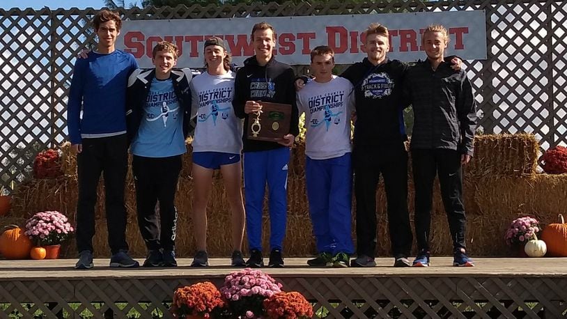 The Miamisburg boys cross country team won the program’s first district championship since 1969 last Saturday at Cedarville. The top seven runners (left to right) are Parker Hines, Brenden Evans, Thomas Williamson, Corey Reese, Nathan Shatto, Ethan Johnson, Clay Campbell. Contributed