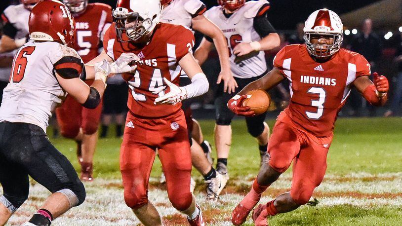Carlisle’s D.J. Chambers (3) looks for running room during an Oct. 6, 2017, game against visiting Madison. The Mohawks won 31-14. NICK GRAHAM/STAFF
