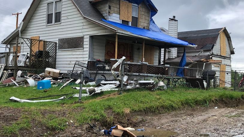 This house was one of many homes and businesses badly damaged in the Northridge section of Harrison Twp. by the Memorial Day tornado. STAFF PHOTO/Lynn Hulsey