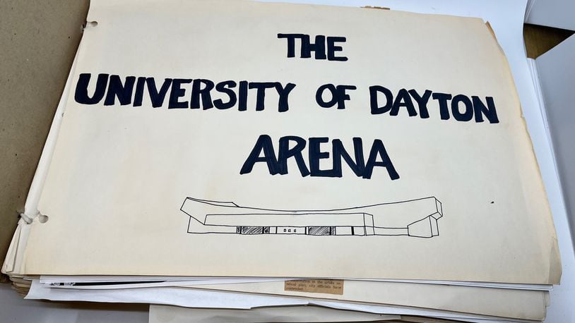 PHOTOS FROM THE BOOK: The Epicenter of College Basketball: A History of UD Arena — The scrapbook kept by Tom Frericks, the man most responsible for getting UD Arena built, includes newspaper clips, photos and other material related to the construction of the arena. Photo by David Jablonski