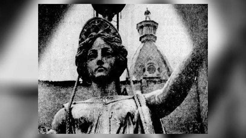 A statue representing the Goddess of Liberty was originally placed atop the Gebhart Opera House the July 3, 1879.