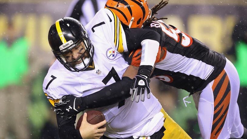 Vontaze Burfict #55 of the Cincinnati Bengals sacks Ben Roethlisberger #7 of the Pittsburgh Steelers in the third quarter during the AFC Wild Card Playoff game at Paul Brown Stadium on January 9, 2016 in Cincinnati, Ohio. Roethlisberger was injured on the play. (Photo by Andy Lyons/Getty Images)