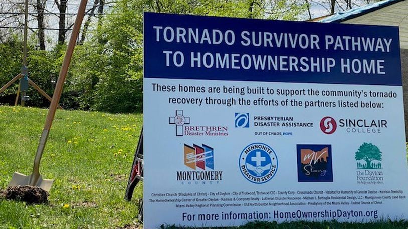 City leaders, county commissioners, and community partners prepare to break ground on a new home for a family impacted by the Memorial Day tornadoes.