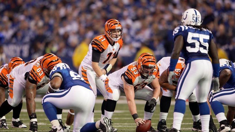 INDIANAPOLIS - DECEMBER 07: Ryan Fitzpatrick #11 of the Cincinnati Bengals calls out signals at the line of scrimmage against the Indianapolis Colts at Lucas Oil Stadium on December 7, 2008 in Indianapolis, Indiana. (Photo by Andy Lyons/Getty Images)