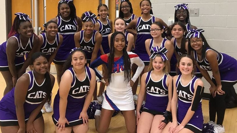 Because of the weather, a middle school only had one cheerleader make it to a basketball game -- but she still wanted to cheer on her team. (Antoinette Jones)