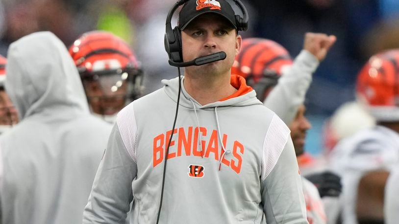 Cincinnati Bengals head coach Zac Taylor walks the sidelines during the second half of an NFL football game against the Tennessee Titans, Sunday, Nov. 27, 2022, in Nashville, Tenn. (AP Photo/Gerald Herbert)