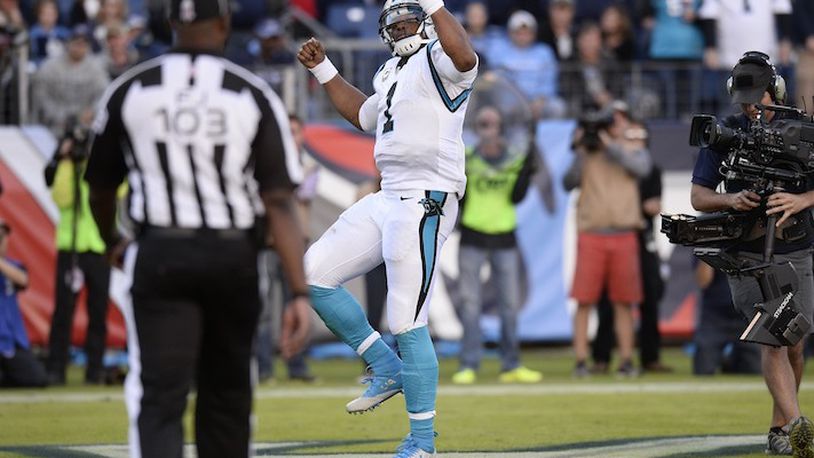 Carolina Panthers quarterback Cam Newton dances after scoring a touchdown against the Tennessee Titans in the second half of an NFL football game Sunday, Nov. 15, 2015, in Nashville, Tenn. (AP Photo/Mark Zaleski)