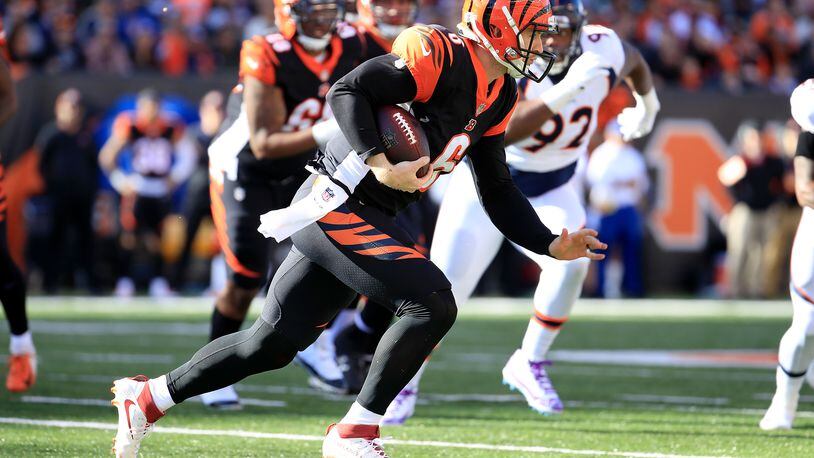 CINCINNATI, OH - DECEMBER 2: Jeff Driskel #6 of the Cincinnati Bengals runs with the ball during the first quarter of the game against the Denver Broncos at Paul Brown Stadium on December 2, 2018 in Cincinnati, Ohio. (Photo by Andy Lyons/Getty Images)