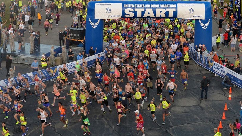 Runners take off for the start of the 21st annual U.S. Air Force Marathon Sept. 16, 2017, at Wright-Patterson Air Force Base. More than 13,500 runners participated in a 5K, 10K, half and full marathon supported by more than 2,400 volunteers. (U.S. Air Force photo/Wesley Farnsworth)