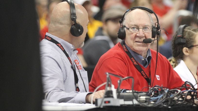 Bucky Bockhorn, right, is honored as he calls a Dayton game against Davidson on WHIO Radio with Larry Hansgen during the Atlantic 10 quarterfinals on Friday, March 10, 2017, at PPG Paints Arena in Pittsburgh.