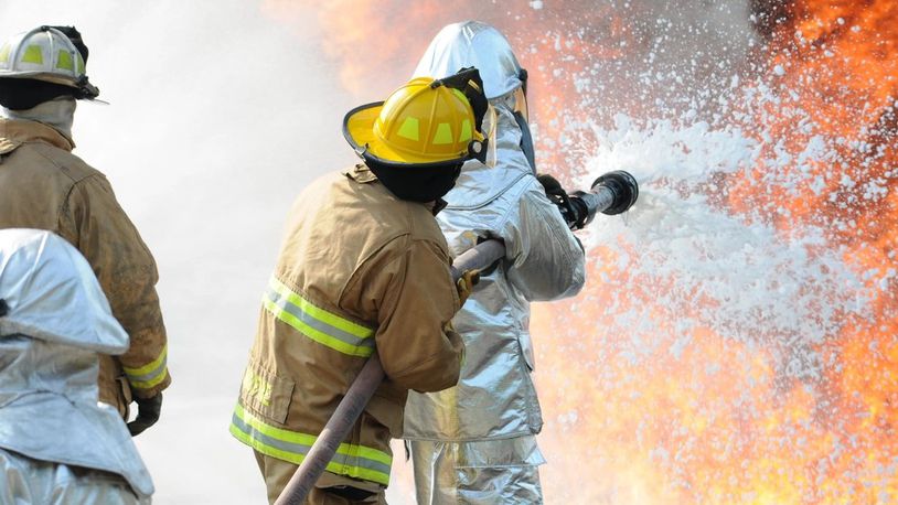 In this 2015 file photo, U.S. Air Force and New Jersey state fire protection specialists from the New Jersey Air National Guard's 177th Fighter Wing battle a simulated aircraft fire with Aqueous Film Forming Foam at Military Sealift Command Training Center East in Freehold, N.J. on June 12. (U.S. Air National Guard photo by Airman 1st Class Amber Powell/Released)