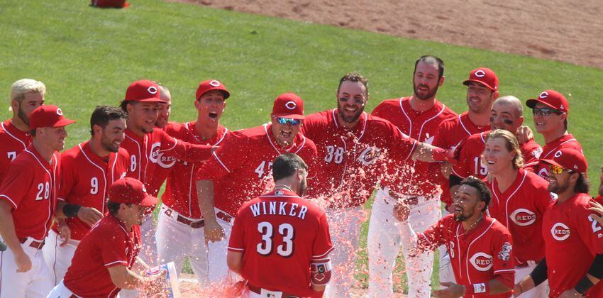 Winker hits two-run home run in 13th to lift Reds