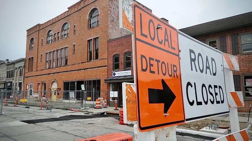 The 100 block of West Main Street in Troy is completely blocked off June 27, 2023, after city officials declared the controversial Tavern building there unsafe. MARSHALL GORBY \STAFF