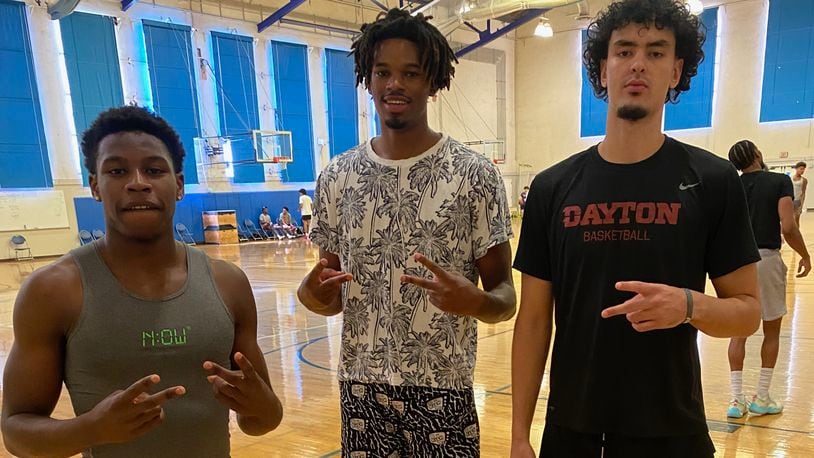 Dayton's Malachi Smith, DaRon Holmes II and Mustapha Amzil pose for a photo at UCLA’s Student Activities Center in August, 2022. Photo by Chris Williams