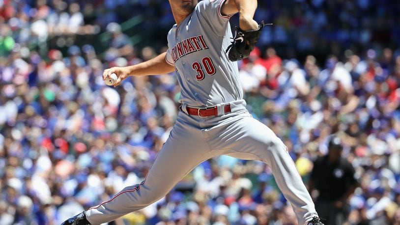 CHICAGO, IL - JULY 06: Starting pitcher Tyler Mahle #30 of the Cincinnati Reds delivers the ball against the Chicago Cubs at Wrigley Field on July 6, 2018 in Chicago, Illinois. (Photo by Jonathan Daniel/Getty Images)