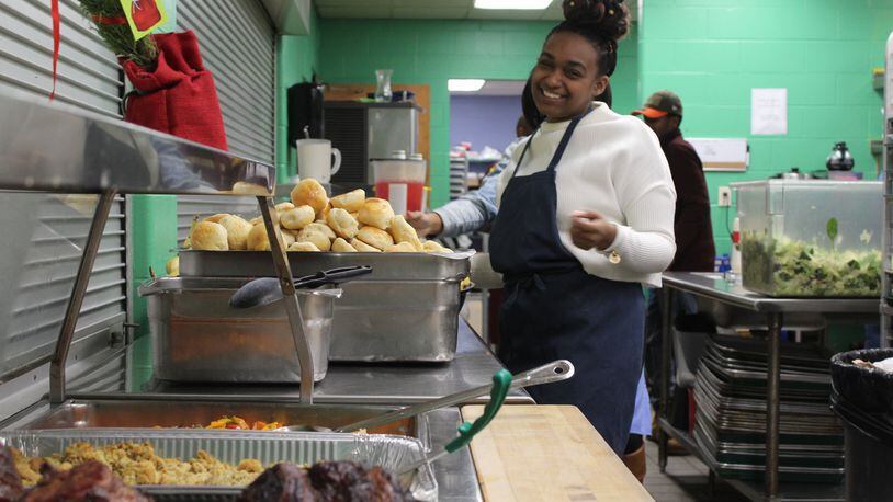 Asha Wooten, 26, volunteered at the House of Bread on Christmas Day. She was one of nearly a dozen volunteers to prepare and serve food.