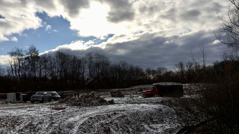 A construction crew was performing site work Tuesday for an assisted-living center yet to be approved by the Springboro Planning Commission. STAFF/LAWRENCE BUDD