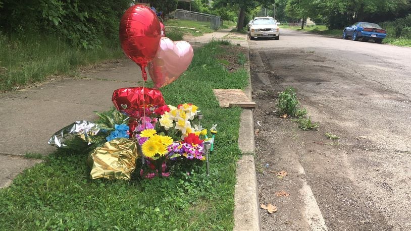 A makeshift memorial was placed near the spot where Sherrell Wheatley was shot on May 19. Wheatey, 62, died at an area hospital. Police say she was an innocent victim and that a drive-by shooter’s bullets were not meant for her.