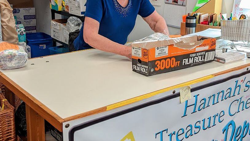 Linda, a diaper volunteer at Hannah's Treasure Chest, wraps diapers. The nonprofit is collecting diapers for local families in need. CONTRIBUTED