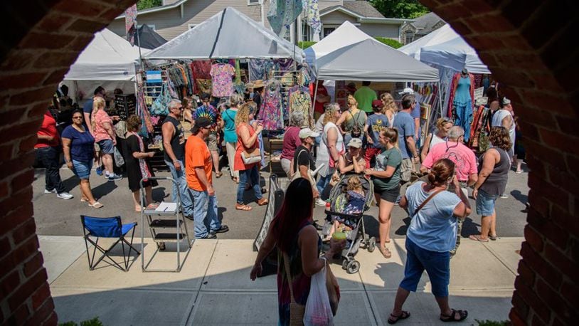 In this 2018 file photo, visitors to Yellow Springs enjoy music, crafts, food, entertainment and shopping at the Yellow Springs Street Fair. FILE