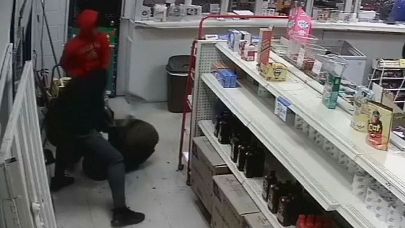 Police are searching for a group of teenagers seen on video beating a convenience store clerk. (WSBTV.com)