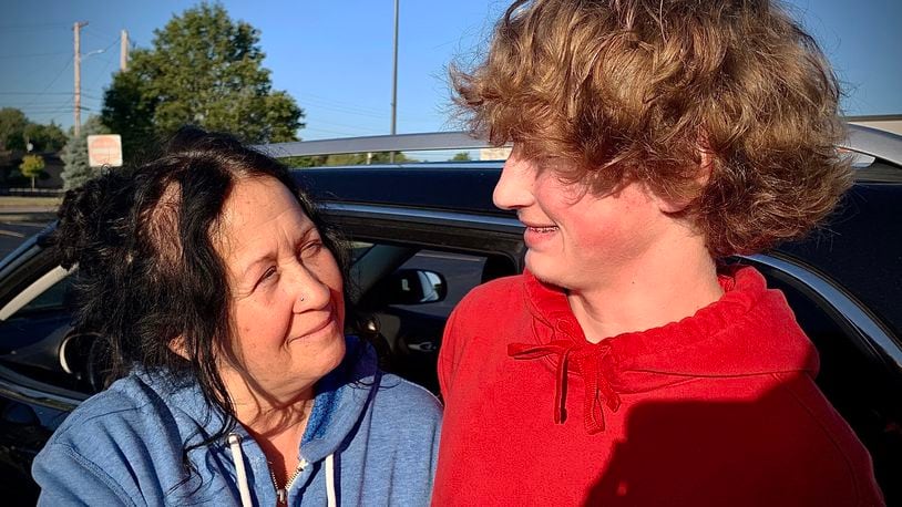 Donna Rue is thankful for Troy High School upperclassmen who helped her son Lucas Hope get away from the school Friday, Sept. 15, 2023 after an announcement of a active shooter at the high school. The announcement was a mistake and there was no shooter. MARSHALL GORBY\STAFF