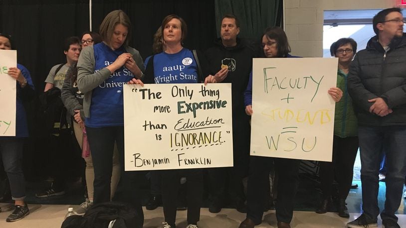 Members of Wright State University’s faculty union rallied and marched on Wednesday to protest a contract proposed by the administration. Faculty members are threatening to strike if a deal on a contract is not reached.