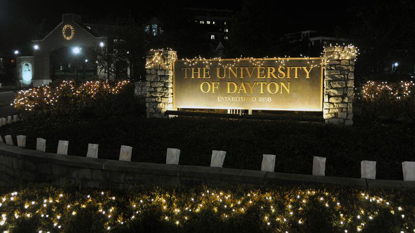 The University of Dayton campus sign - decorated for Christmas. Christmas on Campus takes place annually on Dec. 8 and this year is the 53rd annual event. (Contributed)