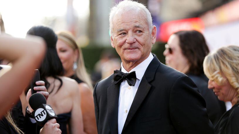 Actor and comedian Bill Murray got into a confrontation with a photographer at a restaurant in Martha's Vineyard, that ended with Murray pouring a glass of water on him, according to police.