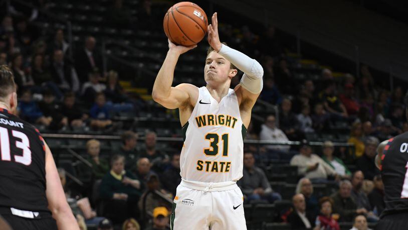 Wright State point guard Cole Gentry shoots against UIC earlier this season at the Nutter Center. Joseph Craven/CONTRIBUTED