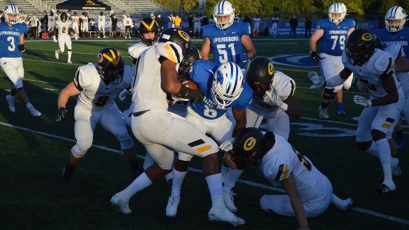 Springboro's Moise Armbruster (8) fights for yards against Centerville on Friday, Sept. 18, 2020. Eric Frantz/CONTRIBUTED